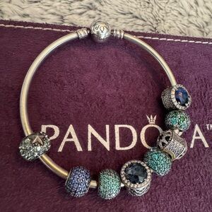 Blues greens navy Authentic Pandora bracelet and 8 beads